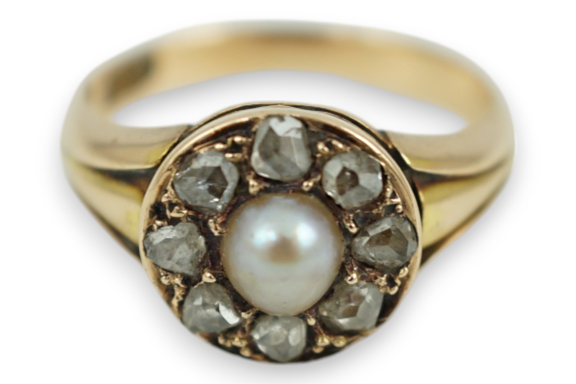 A Victorian 15ct gold, spilt pearl and rose cut diamond set circular cluster ring, size L, gross weight 4.4 grams.